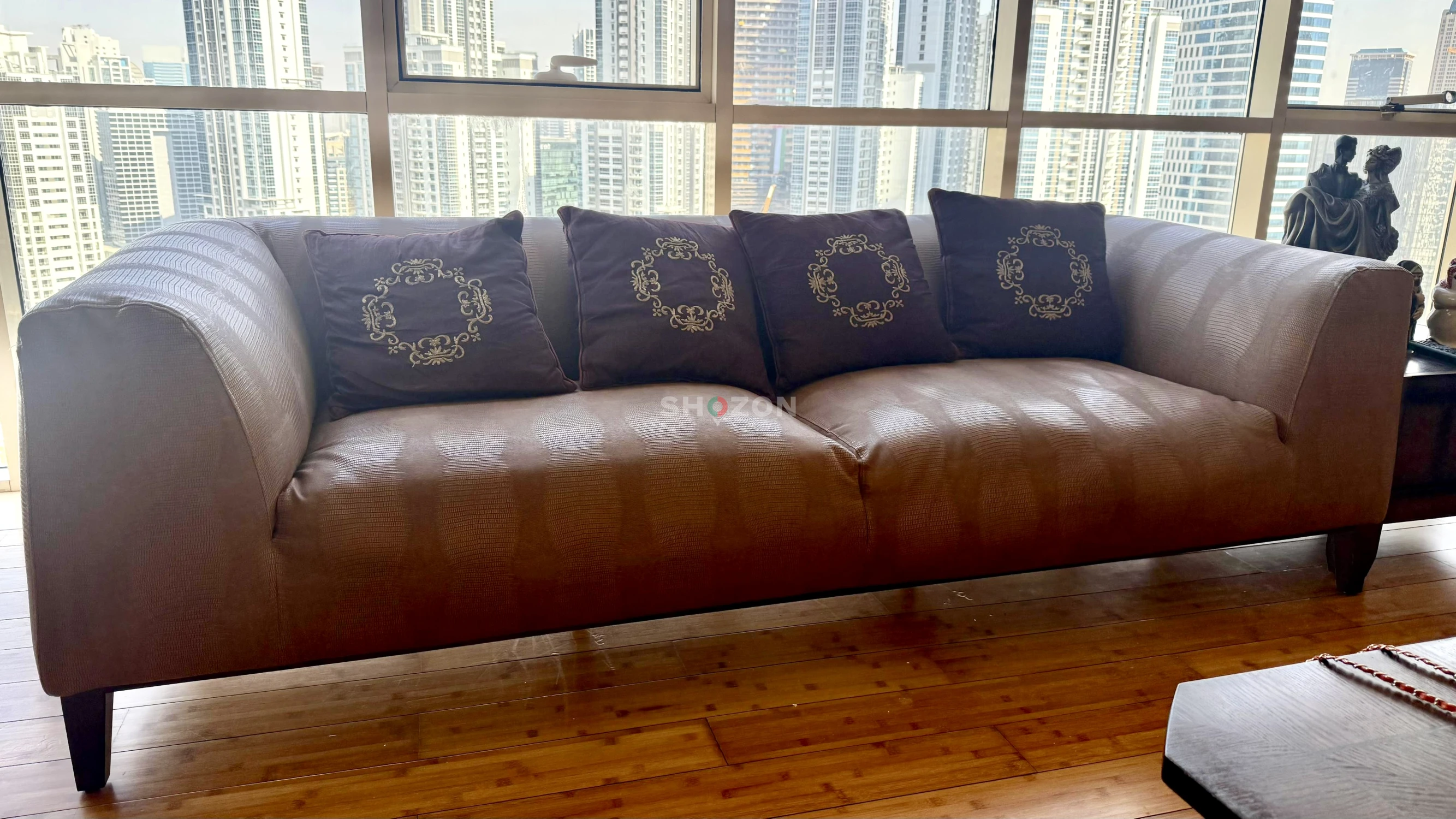 Stylish 4 seater  Sofa   hide and  comfortable no cushions 