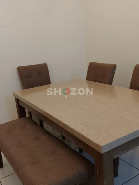 Used Table and chairs for sale in Satwa 