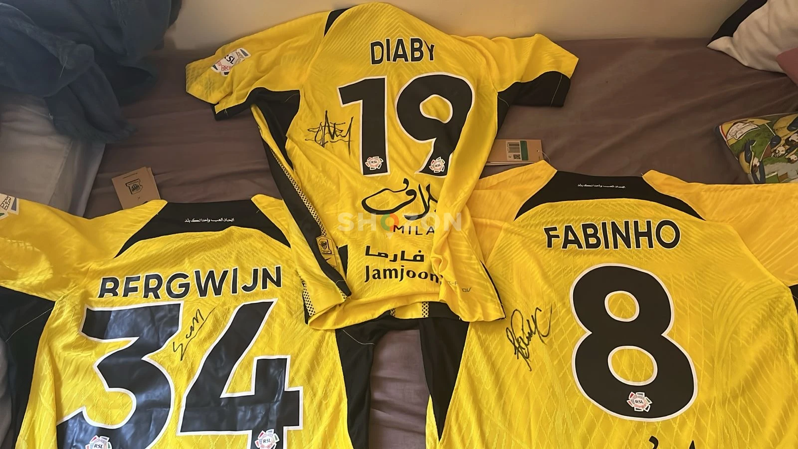 signed shirts by diaby/fabinho/berjwin,im giving the best price for 3 signed shirts in abudhabi 