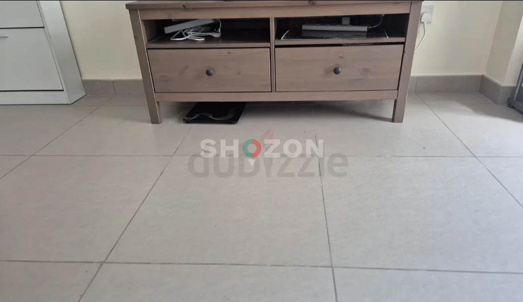 wooden TV stand with storage drawers