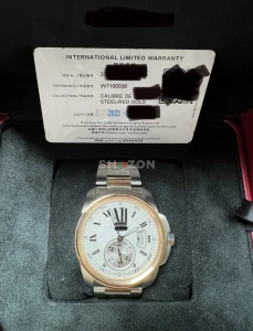 cartier calibre gold and steel