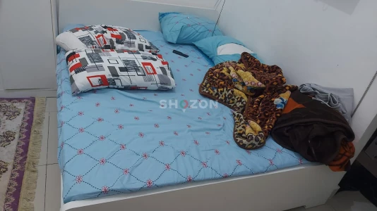 bad with mattress and sofa bad and carpets