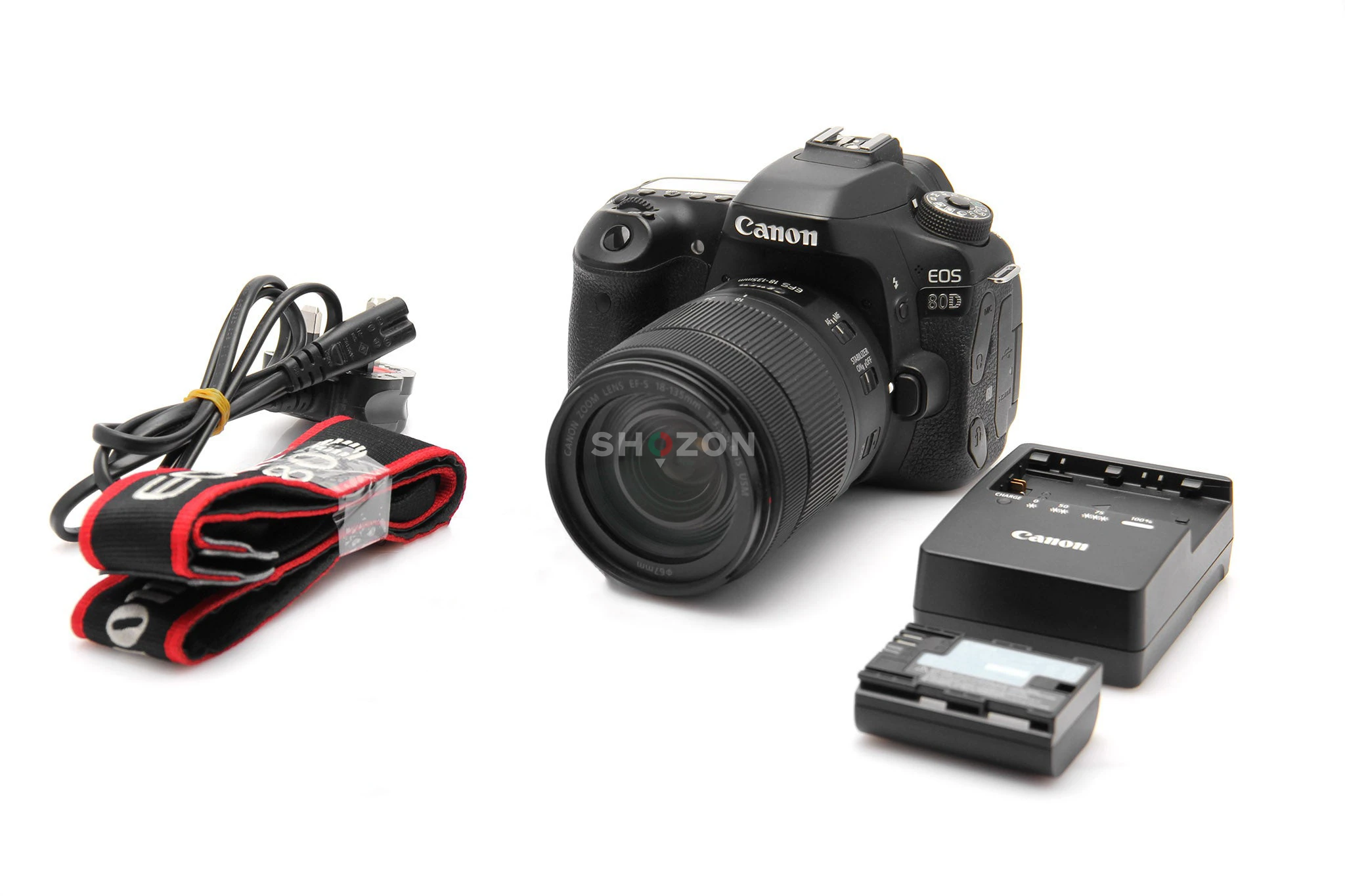 Canon EOS 80D with 18-135mm Lens + Charger Strap, and more accessories.