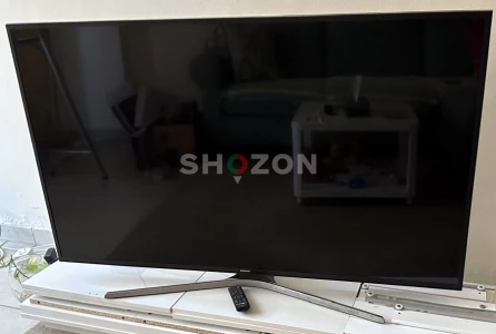 55 Smart UHD TV with Stand (Good Condition)