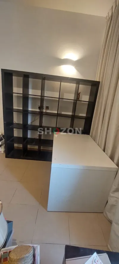 Stylish Black Bookcase with desk attachment